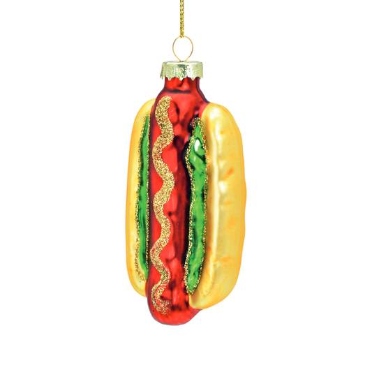 Grappige glazen kerstbal in de vorm van een hotdog (hoogte 9 cm) - een verrassende toevoeging aan je feestelijke kerstversiering!"  Engels: "Cute glass Christmas bauble shaped like a hotdog (height 9 cm) - a delightful addition to your festive Christmas decorations!"